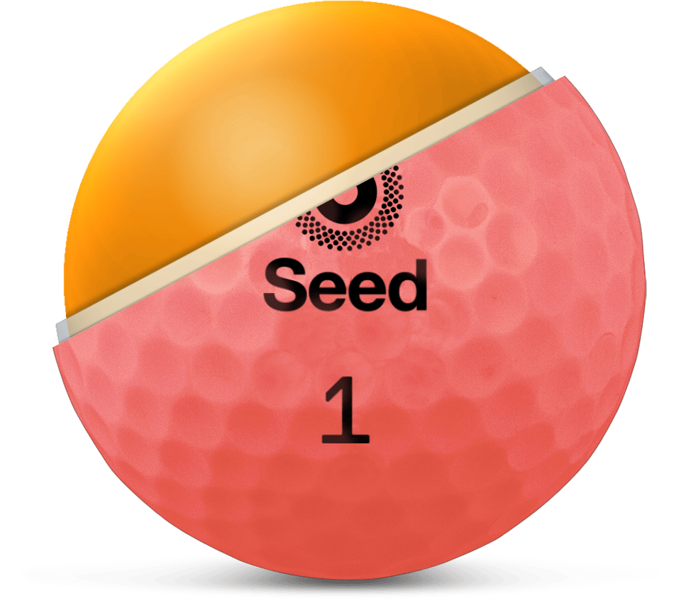 
                  
                    Golf ball with red top and white bottom, featuring the brand 'Seed'.
                  
                